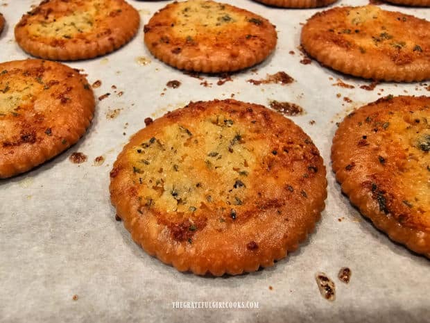 After baking for 7 minutes, the seasoned crackers are golden and crisp.