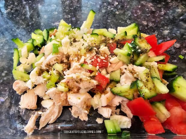 Greek salad dressing is added to the chicken wrap filling.