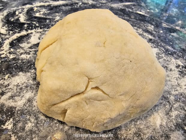 Gnocchi dough is kneaded until it becomes a non-sticky ball of dough.