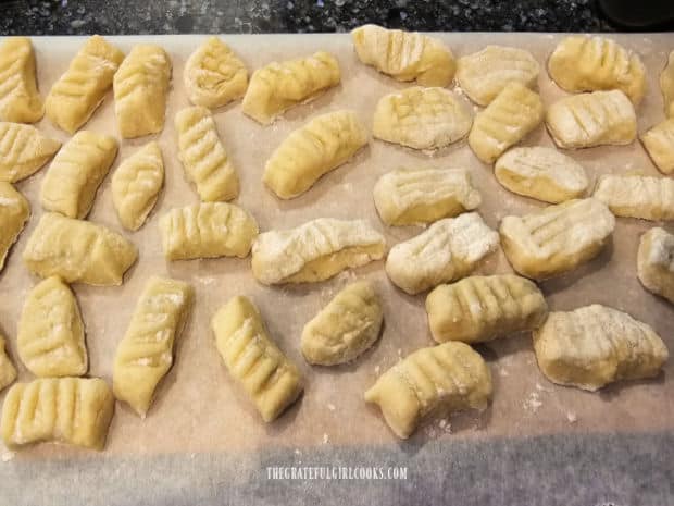 Some of the larger-style homemade potato gnocchi, ready for cooking.