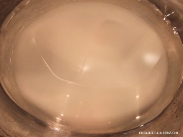 A light syrup is made to use in filling the canning jars after mandarins are added.