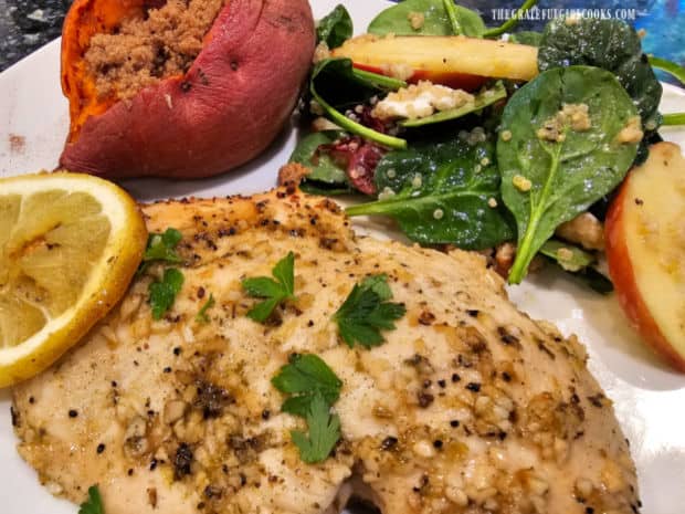Spinach Apple Quinoa Salad is served with lemon chicken and a baked sweet potato.