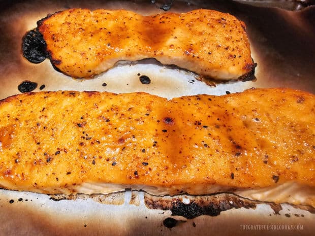 After cooking, the broiled honey Dijon salmon is cooked through and flakes easily.