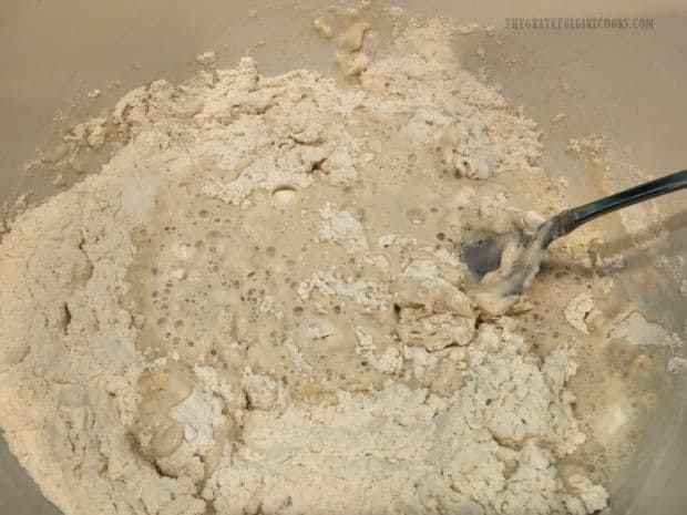 Cheddar Chive No-Knead Bread - The Grateful Girl Cooks! Flour, salt, yeast and warm water are combined in a large bowl.