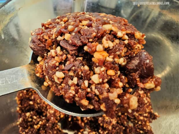 A Tablespoon of date mixture is used to form each energy ball.