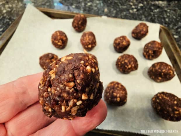 Holding up one of the energy balls for a closeup photo.