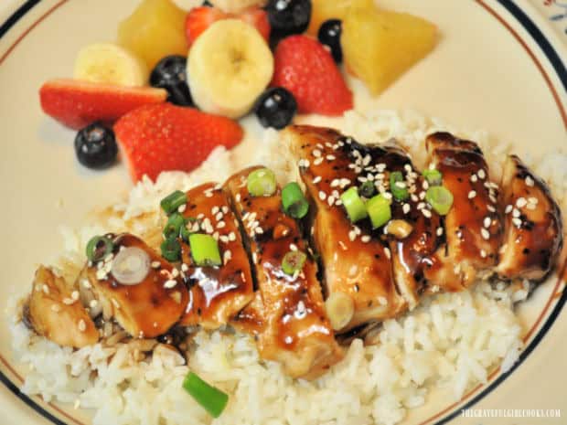 Homemade Teriyaki Glaze - The Grateful Girl Cooks! Cooked chicken with homemade teriyaki glaze on a plate with rice and fruit salad.