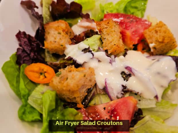 It's quick and easy to make delicious, well-seasoned Air Fryer Salad Croutons to add crunch and flavor to a favorite mixed green salad.