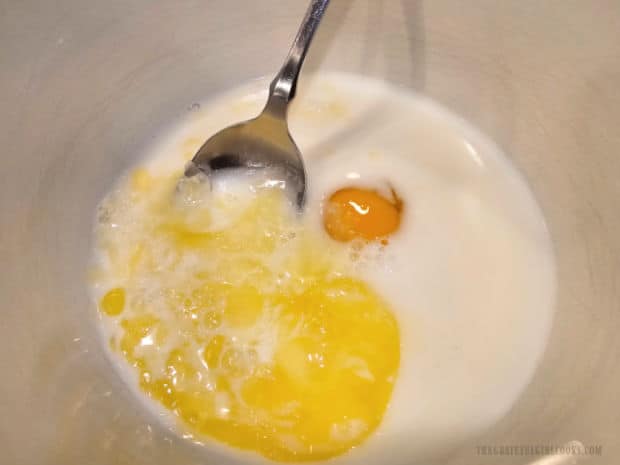 An egg, milk and melted (and cooled) butter are put in a separate small bowl.