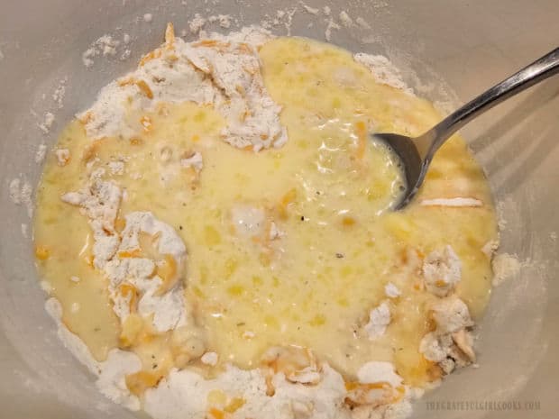 Egg mixture is added to the dry ingredients and stirred until combined.