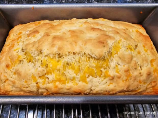 After baking for 45 minutes, the cheddar cheese bread is golden brown.