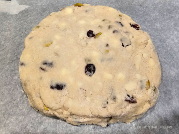 Dough for cranberry pistachio scones is shaped into a 7" circle.