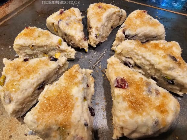 Raw sugar is sprinkled onto each of the scones before baking.