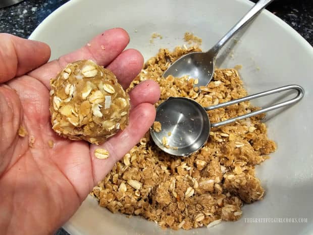 The cookie dough is shaped into 24 round balls.