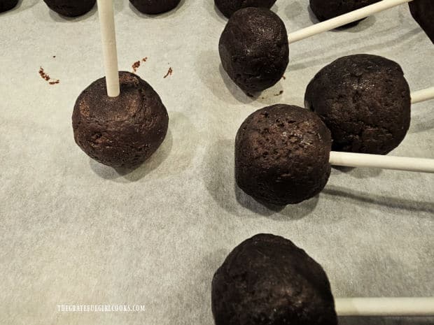 Lollipop "sticks" are inserted into each chocolate pop.