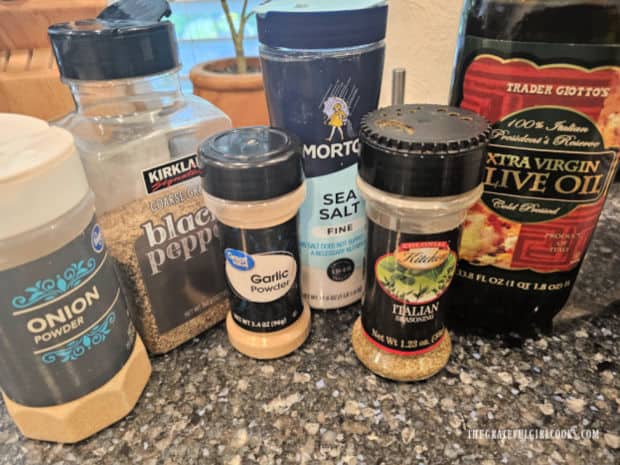 Spices and olive oil that will be used to season the vegetables.