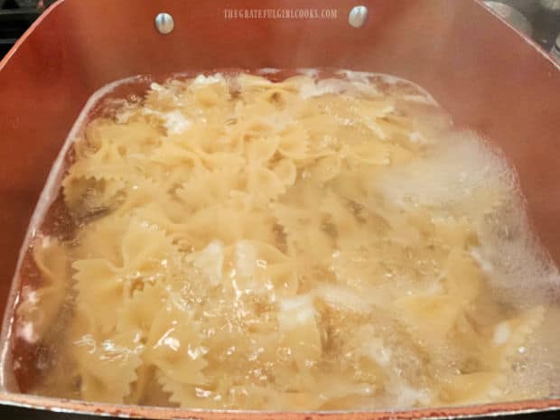 Bowtie pasta is cooked for 10-12 minutes in boiling water.