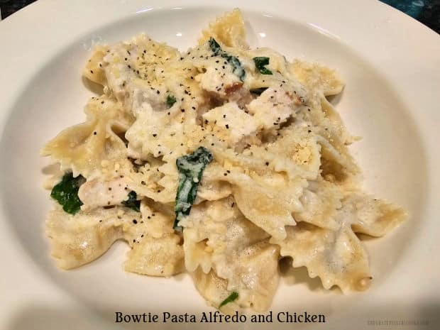 Bowtie Pasta Alfredo and Chicken is a delicious 30-minute dish, with pasta, chicken and fresh spinach in a creamy butter Parmesan sauce.