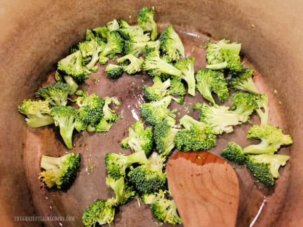 Fresh broccoli florets are quickly cooked in olive oil for 2-3 minutes.