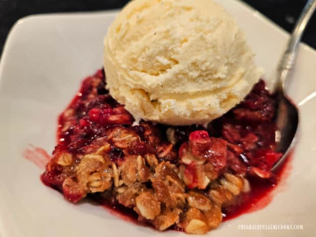 With a scoop of ice cream on top, Instant Pot Blackberry Crisp is ready to eat.