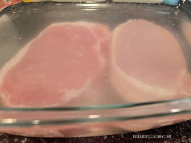 Two 1" thick boneless pork chops in saltwater brine.