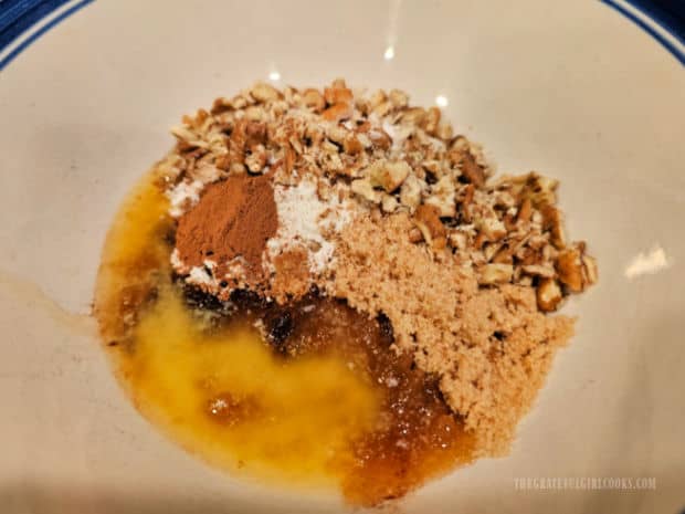 Melted butter, pecans, flour, brown sugar, cinnamon & salt combined in a bowl.