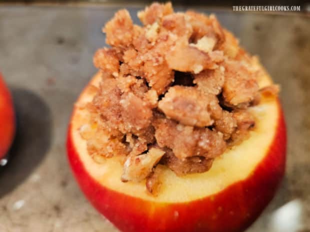Each apple is stuffed full of the streusel filling mixture.