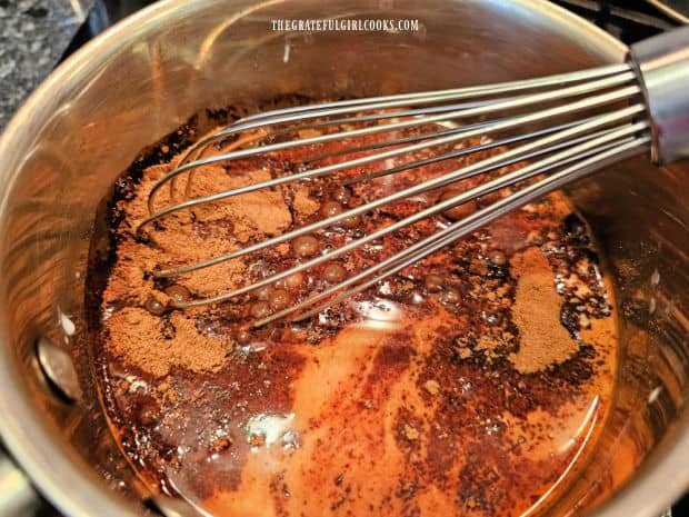 Classic Hot Cocoa For 1 - The Grateful Girl Cooks! Sugar, baking cocoa powder and salt are whisked into warm milk in a saucepan.