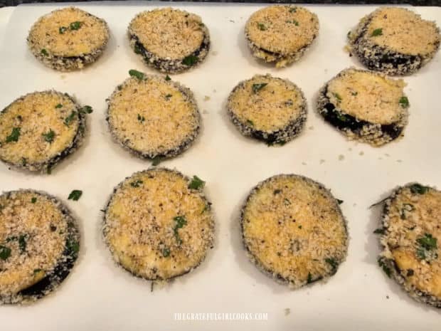 Flour and egg coated slices, covered with breadcrumb topping rest before frying.