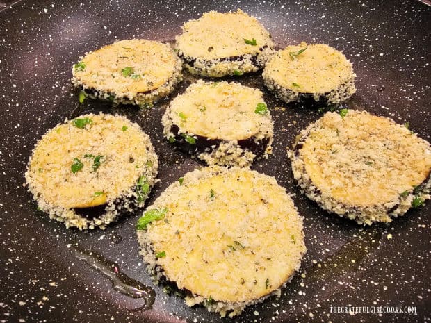 Several slices at a time are cooked in a small amount of hot olive oil in a skillet.