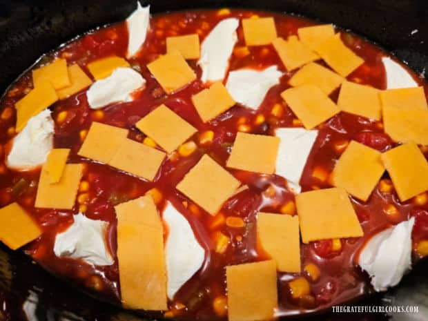 Crockpot Cheesy Enchilada Orzo - The Grateful Girl Cooks! Cream cheese and sharp cheddar are added and mixture is cooked in a crockpot for several hours.