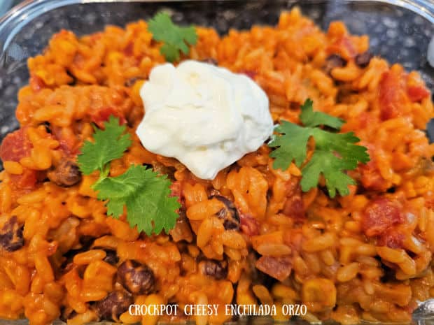 Crockpot Cheesy Enchilada Orzo - The Grateful Girl Cooks! Crockpot Cheesy Enchilada Orzo is a yummy, easy side dish or meatless meal with corn, tomatoes, black beans, cheese, green chiles and spices.