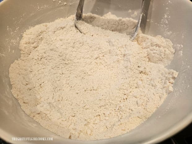 A pastry blender is used to cut the shortening into the baking mix.