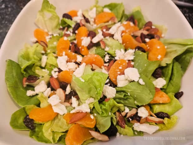 Kimberly's Festive Salad - The Grateful Girl Cooks! The butter lettuce is topped with mandarins, cranberries, feta and slivered almonds.