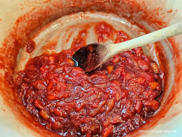 The jam will thicken quite a bit as it continues to cook and then is cooled.