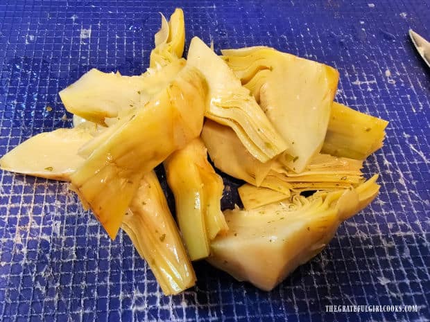 Artichoke Chicken Bake For Two - The Grateful Girl Cooks! Drained, marinated artichoke hearts, ready to be chopped.