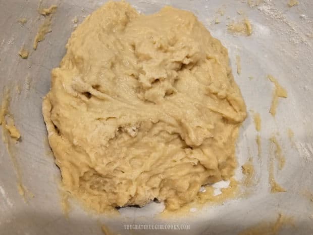 Dough is thick and "shaggy" when fully combined.