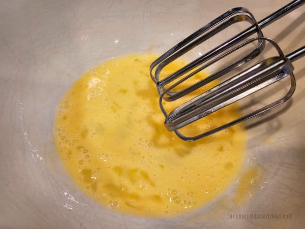 Classic Pumpkin Pie - The Grateful Girl Cooks! Two eggs are lightly beaten before adding other ingredients for the pie filling.