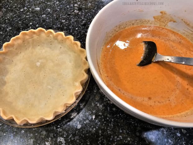 Classic Pumpkin Pie - The Grateful Girl Cooks! Pumpkin pie filling is ready to pour into the prepared pie crust.