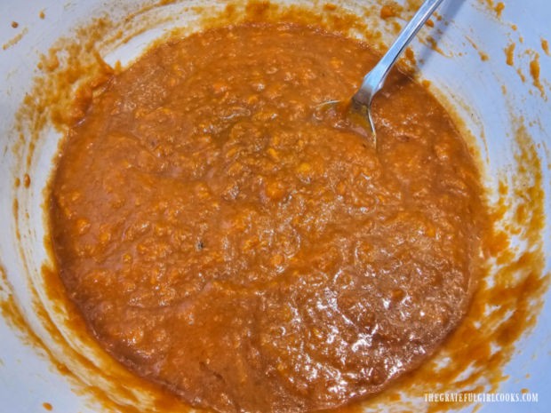 The seasoned mashed sweet potatoes are now combined with the spices, etc.