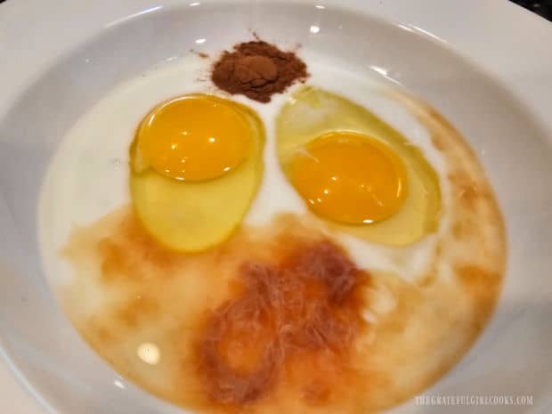 Crunchy Air Fryer French Toast - The Grateful Girl Cooks! Two large eggs, milk, cinnamon and vanilla are combined in a bowl.