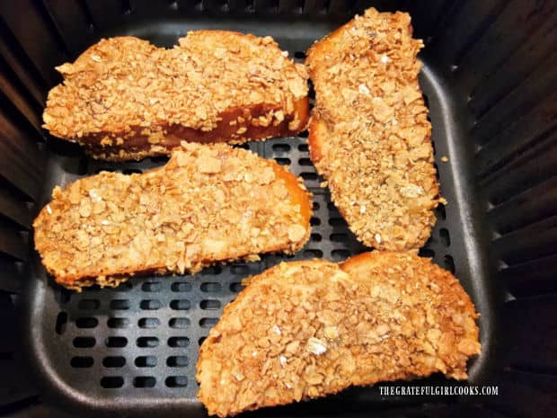 Crunchy Air Fryer French Toast - The Grateful Girl Cooks! The crunchy air fryer French toast in the basket of the air fryer.