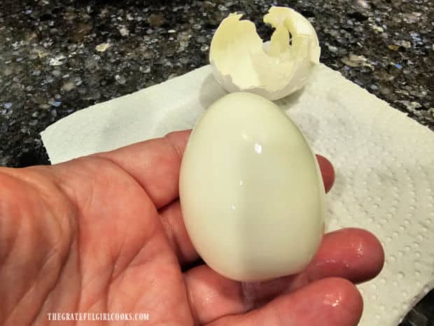 A hard-boiled egg peels easily after cooking in the Instant Pot.