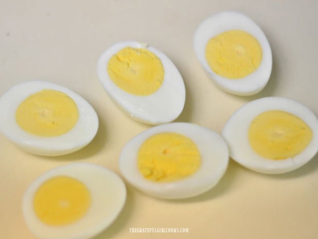 Hard-boiled eggs, cut in half after cooking and cooling.