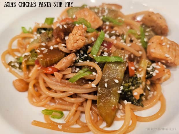 Asian Chicken Pasta Stir-Fry features lots of fresh veggies and noodles cooked in an Asian-inspired sauce. It's an easy and delicious meal!