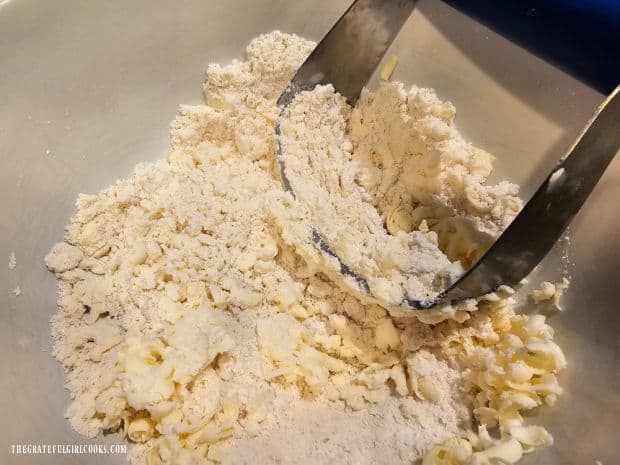 A pastry blender is used to "cut" the cold butter into the dry ingredients.