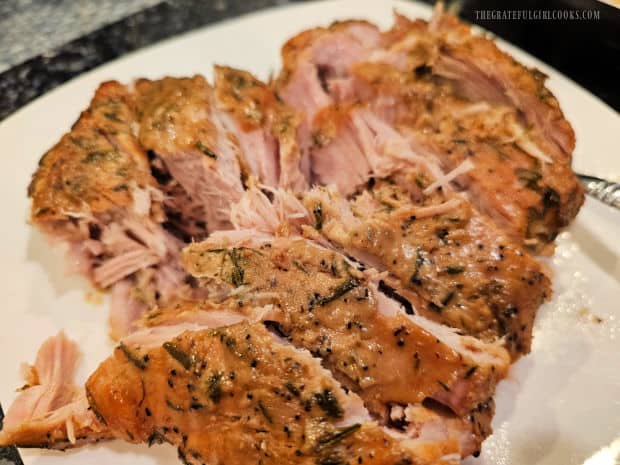 The pork is so tender it can easily be sliced or shredded with a fork.