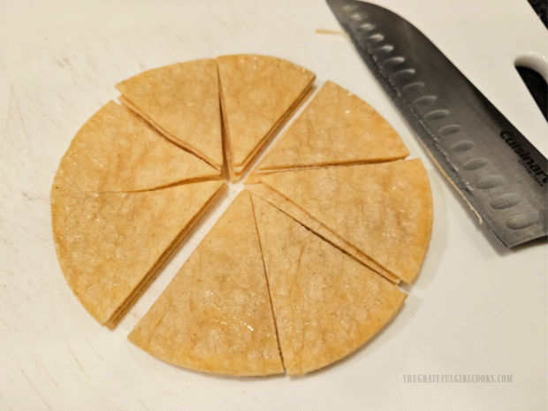 The tortillas are stacked together, then cut into 8 wedges each.