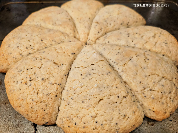 After baking, the lemon poppyseed scones rest and cool, then are separated.