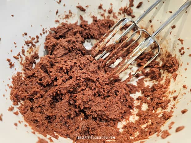 Peanut Butter and Nutella Cookies - The Grateful Girl Cooks! The four ingredients for the cookies are beaten using an electric mixer.